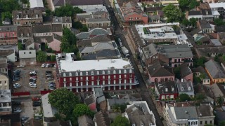 4K aerial stock footage fly over French Quarter apartment building and street in New Orleans, Louisiana Aerial Stock Footage | PVED01_118