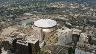 4K aerial stock footage orbit the Superdome and New Orleans Arena in Downtown New Orleans, Louisiana Aerial Stock Footage | PVED01_123