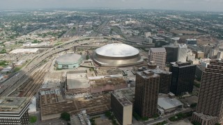 PVED01_139 - 4K aerial stock footage orbiting the Louisiana Superdome and the New Orleans Arena in Downtown New Orleans, Louisiana