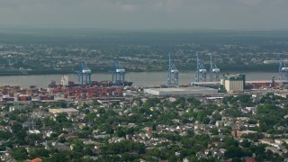 PVED01_146E - 4K aerial stock footage orbit cranes and containers at the Port of New Orleans in Louisiana