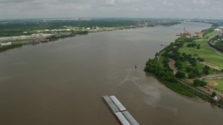 PVED01_150 - 4K aerial stock footage fly over a barge on the Mississippi River near New Orleans, Louisiana