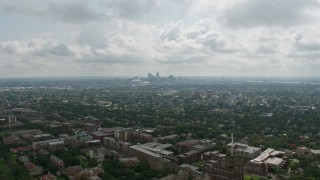 4K aerial stock footage fly over Carrollton College and suburbs to approach Downtown New Orleans, Louisiana Aerial Stock Footage | PVED01_153