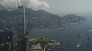 5K stock footage aerial video approach International Commerce Centre in Kowloon and Hong Kong Island in China Aerial Stock Footage | SS01_0004