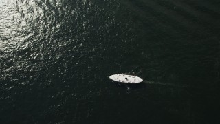 5K stock footage aerial video of a bird's eye view of a ferry sailing Victoria Harbor in Hong Kong, China Aerial Stock Footage | SS01_0017