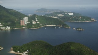 5K stock footage aerial video approach Repulse Bay and waterfront apartment buildings on Hong Kong Island, China Aerial Stock Footage | SS01_0053