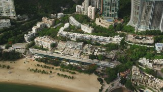 5K stock footage aerial video of beachfront condominium complex on Hong Kong Island, China Aerial Stock Footage | SS01_0057