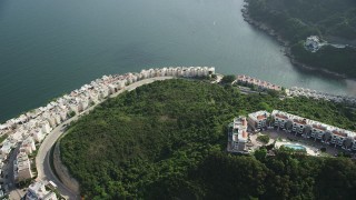 5K stock footage aerial video orbit rows of waterfront condominiums on Hong Kong Island in China Aerial Stock Footage | SS01_0069