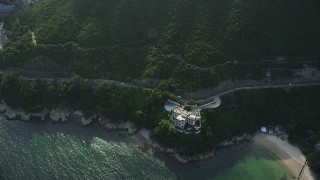 5K stock footage aerial video fly over cove and coastal road on Hong Kong Island, China Aerial Stock Footage | SS01_0072