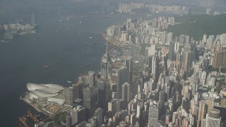 5K stock footage aerial video pan across harbor and convention center in Hong Kong, China Aerial Stock Footage | SS01_0084