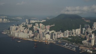 SS01_0089 - 5K stock footage aerial video of harbor-side skyscrapers on Hong Kong Island, China