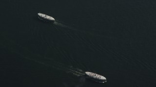 5K stock footage aerial video of two ferries sailing on Victoria Harbor in Hong Kong, China Aerial Stock Footage | SS01_0092