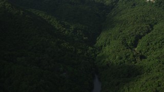 5K stock footage aerial video fly over reservoir and green forest toward a green mountain on Hong Kong Island, China Aerial Stock Footage | SS01_0094