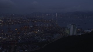 5K stock footage aerial video approach the Port of Hong Kong and the Stonecutters Bridge at night, China Aerial Stock Footage | SS01_0112