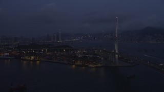 5K stock footage aerial video approach Port of Hong Kong at end of the Stonecutters Bridge at night in China Aerial Stock Footage | SS01_0117