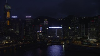 5K stock footage aerial video flyby Central Plaza and high-rises on Hong Kong Island at night, China Aerial Stock Footage | SS01_0152