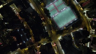 SS01_0174 - 5K stock footage aerial video bird's eye view of city streets at night on Hong Kong Island, China