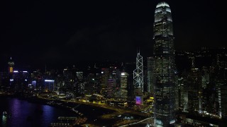 5K stock footage aerial video flyby International Finance Centre and waterfront towers at night on Hong Kong Island, China Aerial Stock Footage | SS01_0186