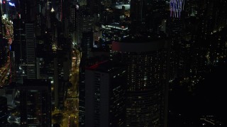 5K stock footage aerial video orbit skyscraper to reveal Bank of China Tower at night on Hong Kong Island, China Aerial Stock Footage | SS01_0226