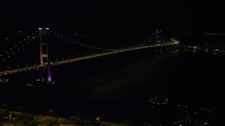 5K stock footage aerial video approach Tsing Ma Bridge at night in Hong Kong, China Aerial Stock Footage | SS01_0241