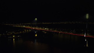 SS01_0246 - 5K stock footage aerial video approach light traffic crossing the Ting Kau Bridge at night in Hong Kong, China