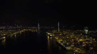 SS01_0262 - 5K stock footage aerial video flyby Port of Hong Kong at night to approach Stonecutters Bridge, China