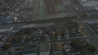 4K stock footage aerial video of Lear Jet landing gear while taking off from Hawthorne Municipal Airport, California Aerial Stock Footage | WA001_001