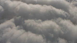 4K stock footage aerial video of a bird's eye view of clouds, with the Pacific Ocean visible through breaks, Southern California Aerial Stock Footage | WA001_004