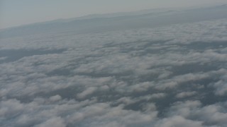 4K stock footage aerial video of clouds over Ventura County while approaching mountain ridges, California Aerial Stock Footage | WA001_012