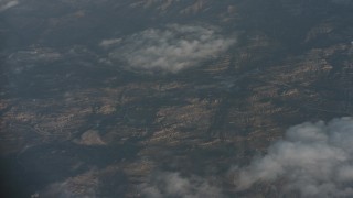 4K stock footage aerial video of a bird's eye view of clouds over mountains and suburbs in Santa Clarita Valley, California Aerial Stock Footage | WA001_016