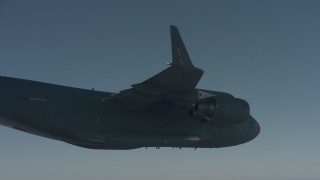 WA001_039 - 4K stock footage aerial video under the wing of a Boeing C-17, Solano County, California