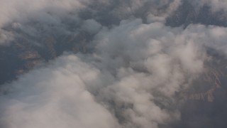 4K stock footage aerial video fly over dense clouds and tilt to mountains in Los Padres National Forest, California Aerial Stock Footage | WA002_012