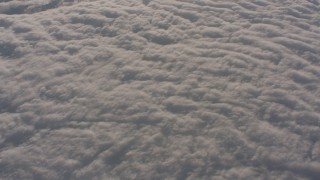 WA002_025 - 4K stock footage aerial video flyby cloud cover and tilt down, Central Valley, California