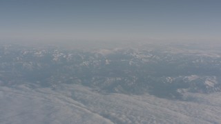 4K stock footage aerial video of a layer of clouds around the Sierra Nevada Mountains, California Aerial Stock Footage | WA002_035