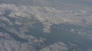 WA002_068 - 4K stock footage aerial video pan across clouds surrounding Lake Tahoe, California