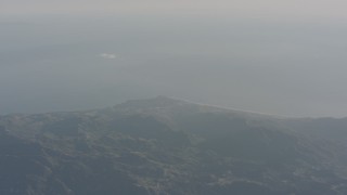 WA003_009 - 4K stock footage aerial video of a view of the Pacific Ocean and Malibu from the Santa Monica Mountains, California