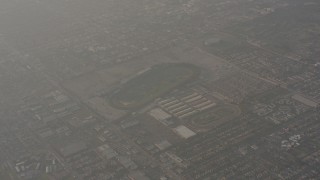 WA003_022 - 4K stock footage aerial video of a reverse view of race tracks in Inglewood, California