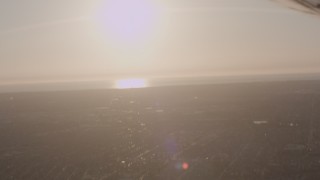 4K stock footage aerial video of a view across neighborhoods to the coast in the South Bay area of Los Angeles, California Aerial Stock Footage | WA003_025