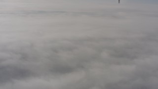 4K stock footage aerial video of a dense cover of clouds over Lassen County, California Aerial Stock Footage | WA004_006