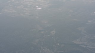 WA004_023 - 4K stock footage aerial video fly away from the Hole-in-the-Ground crater in Lake County, Oregon