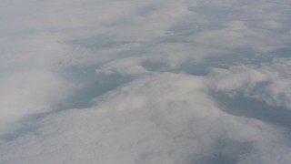 WA004_024 - 4K stock footage aerial video fly over clouds covering Lake County, Oregon