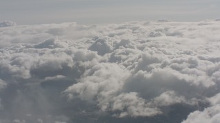 4K stock footage aerial video approach a thick cover of clouds over Washington Aerial Stock Footage | WA004_048