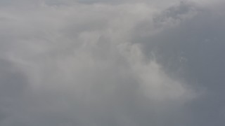 4K stock footage aerial video fly toward a dense cloud layer over Washington Aerial Stock Footage | WA004_068