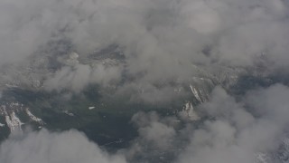 4K stock footage aerial video fly over clouds and snowy mountains in Skamania County, Washington Aerial Stock Footage | WA004_076