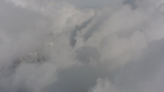 4K stock footage aerial video of a view of dense clouds over Washington Aerial Stock Footage | WA004_079