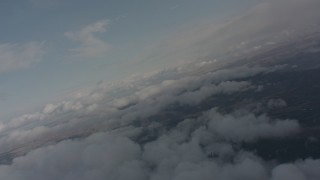 4K stock footage aerial video fly through misty clouds to approach clouds over snowy evergreens in Washington Aerial Stock Footage | WA004_095