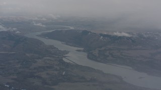 4K stock footage aerial video approach the Columbia River and mountains between Washington and Oregon Aerial Stock Footage | WA004_096