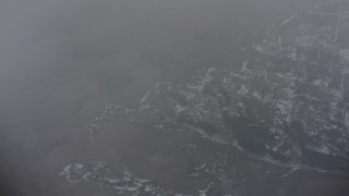 4K stock footage aerial video of a bird's eye view of snowy wilderness below misty clouds in Oregon Aerial Stock Footage | WA004_098