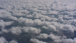 4K stock footage aerial video flyby patchy clouds over farmland in Southern California Aerial Stock Footage | WA005_016