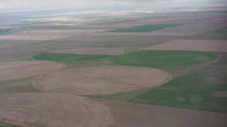 WA005_034 - 4K stock footage aerial video of a view across circular crops fields in Kansas