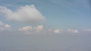 WA005_069 - 4K stock footage aerial video of partly cloudy skies above Ohio farmland